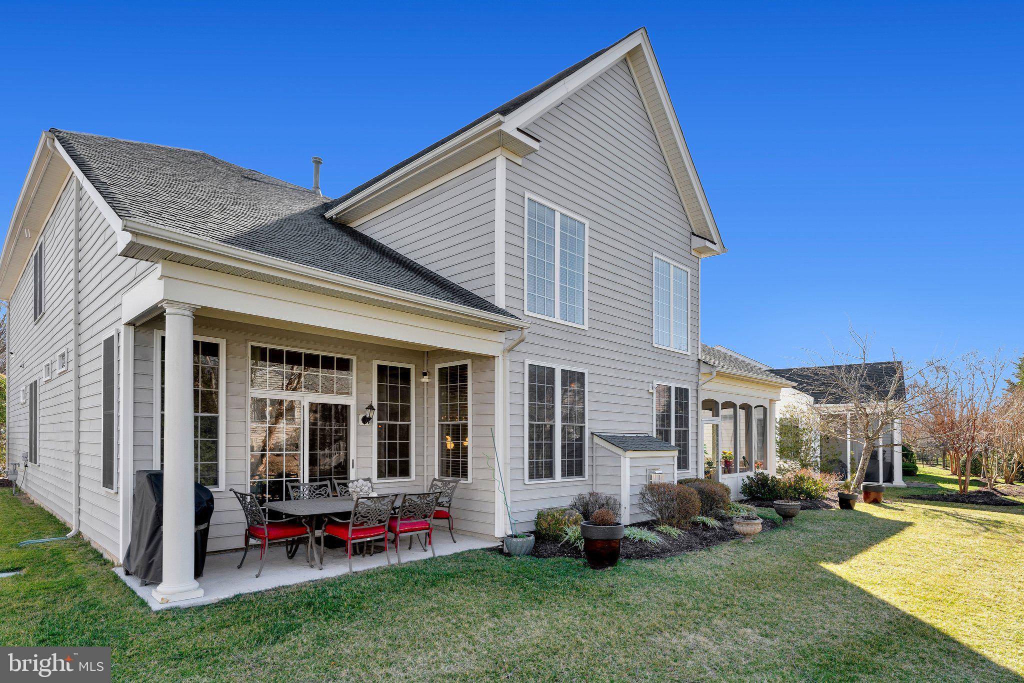 15517 Legacy Way Haymarket, VA 20169 - Photo 45 of 68 a front view of a house with a yard