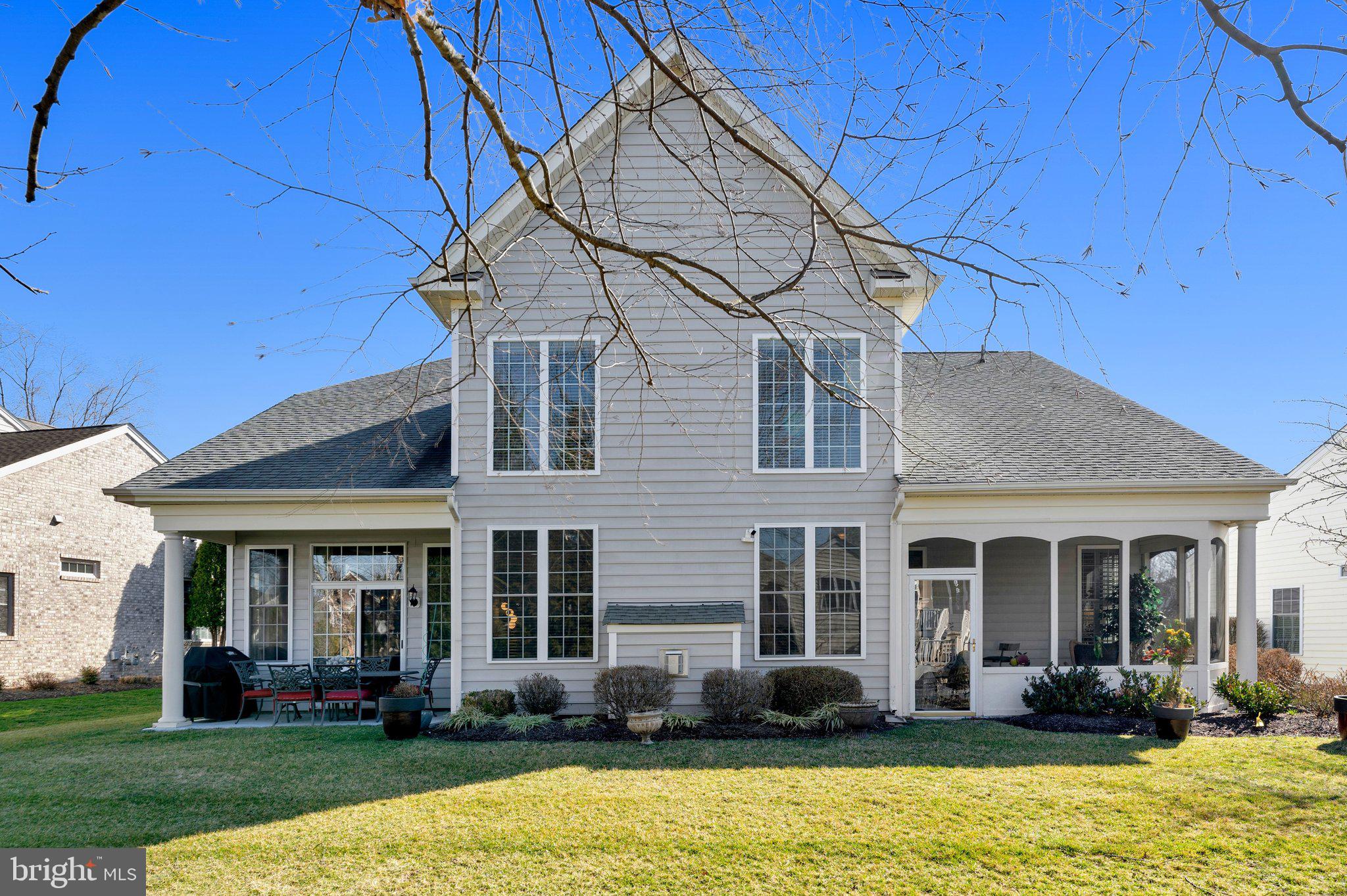 15517 Legacy Way Haymarket, VA 20169 - Photo 52 of 68 a front view of a house with a yard