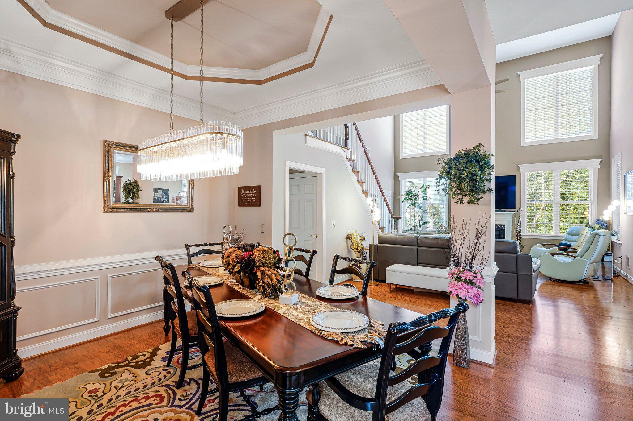 15517 Legacy Way Haymarket, VA 20169 - Photo 5 of 68 a view of a dining room with furniture window and wooden floor