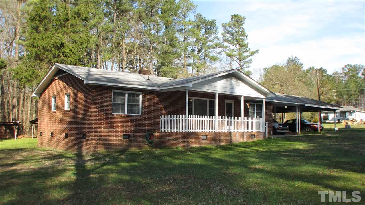 1210 Hamlin Road Durham, NC 27704 - Photo 3 of 18 The home sits off the road and provides some privacy. There is 3 carports.