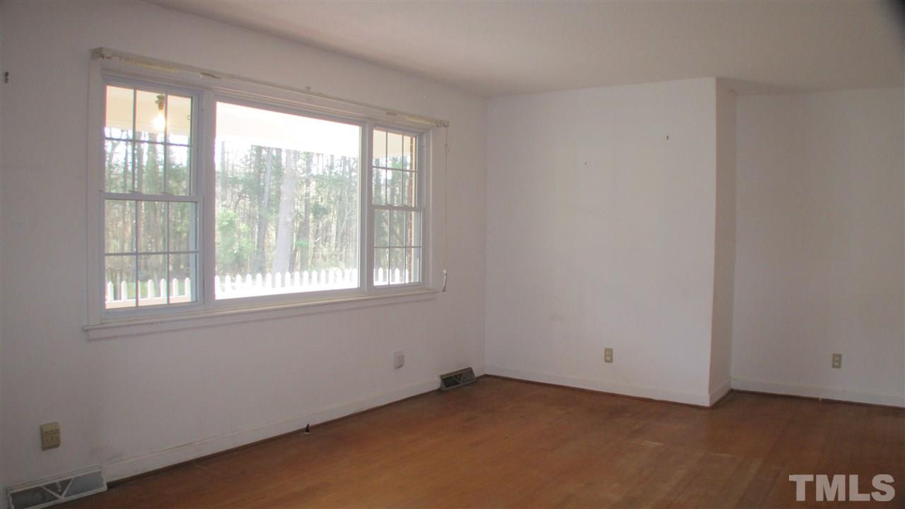 1210 Hamlin Road Durham, NC 27704 - Photo 6 of 18 There are hardwood floors under the carpet in the other rooms too!