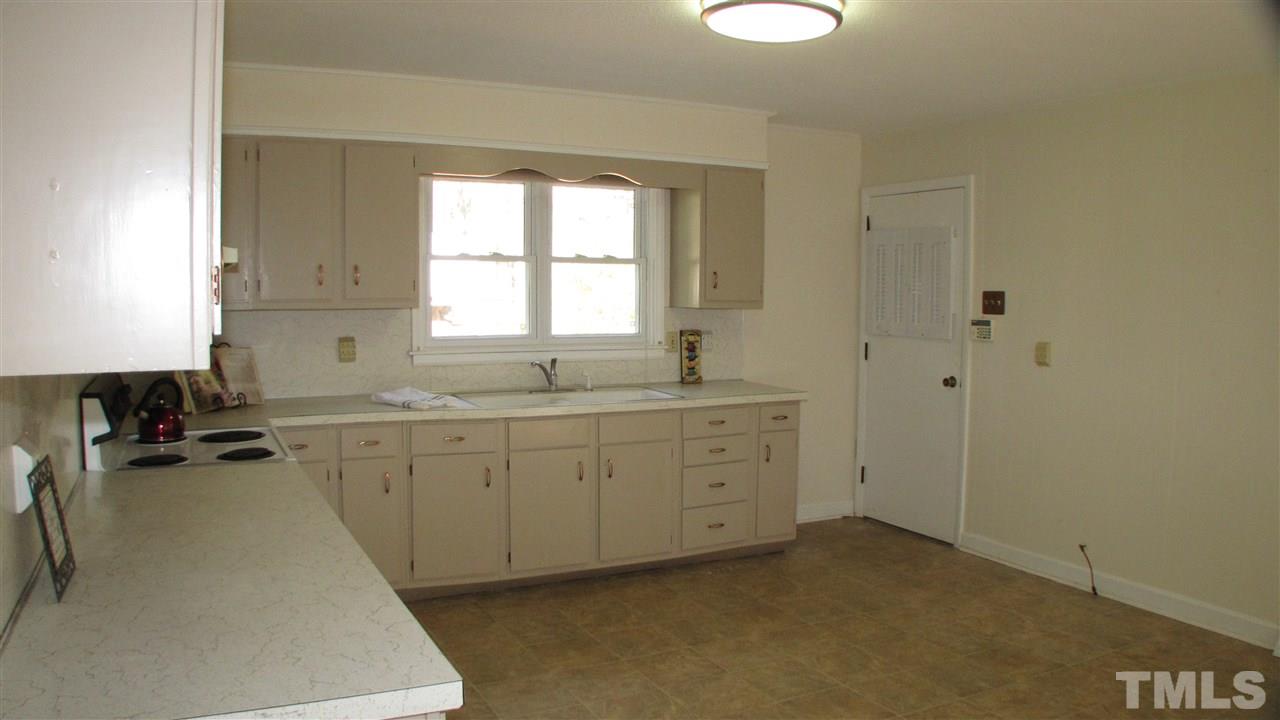 1210 Hamlin Road Durham, NC 27704 - Photo 9 of 18 The Kitchen is large enough for an Eat-In Kitchen area or a Dining Room.