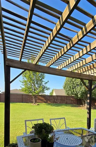 a view of a swimming pool with a outdoor seating