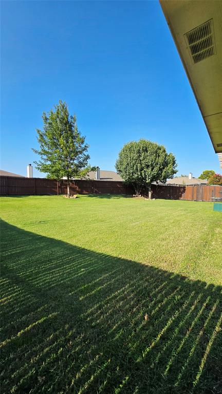 9520 George Washington Drive McKinney, TX 75072 - Photo 5 of 13 a view of a big yard with an outdoor space