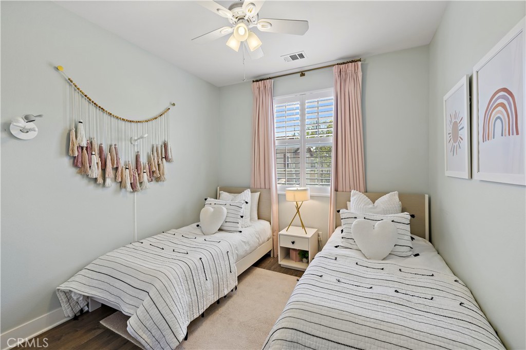 2 Agrios Street Rancho Mission Viejo, CA 92694 - Photo 12 of 29 a bedroom with bed and a window