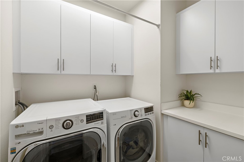 2 Agrios Street Rancho Mission Viejo, CA 92694 - Photo 16 of 29 a utility room with dryer and washer