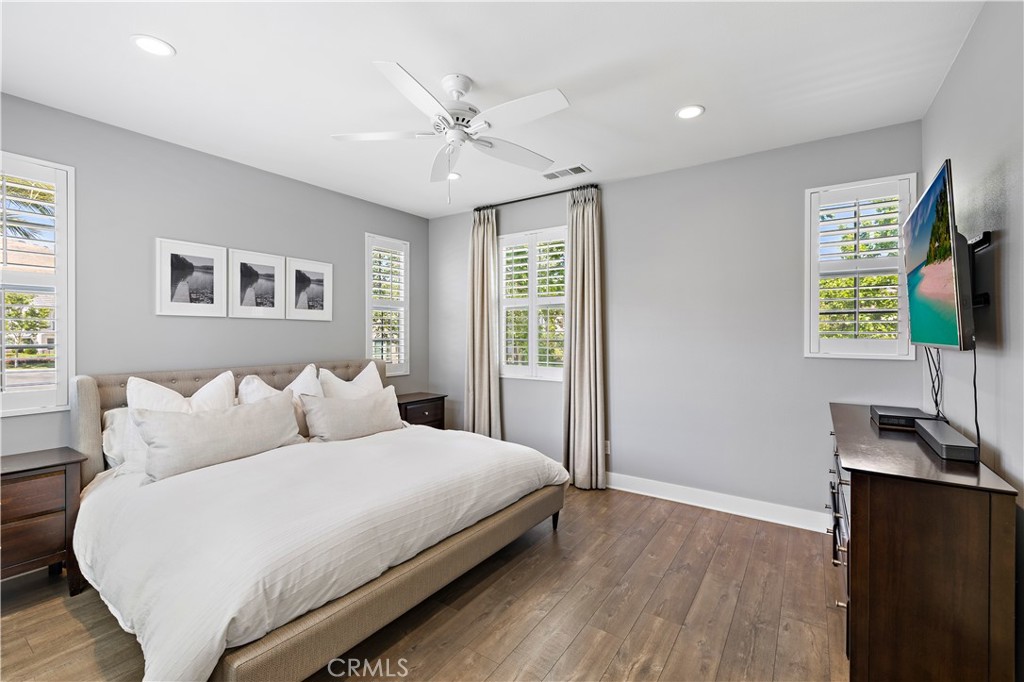 2 Agrios Street Rancho Mission Viejo, CA 92694 - Photo 5 of 29 a bedroom with a bed and a flat screen tv