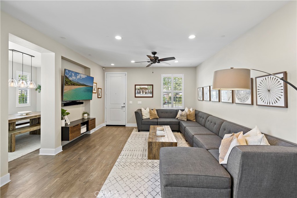 2 Agrios Street Rancho Mission Viejo, CA 92694 - Photo 7 of 29 a living room with furniture and a flat screen tv