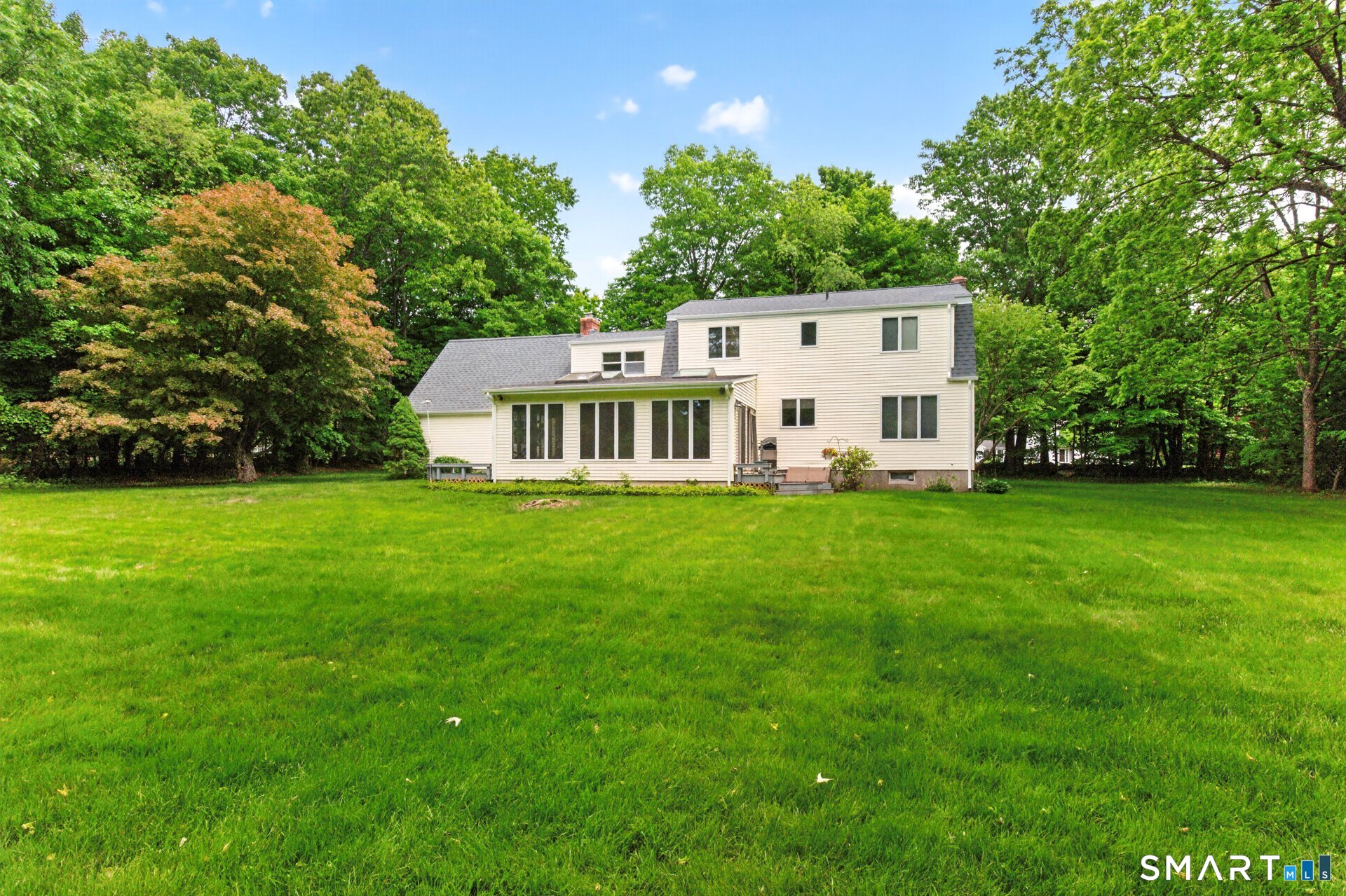 5 Shingle Mill Drive Canton, CT 06019 - Photo 37 of 38 a view of a house with a big yard
