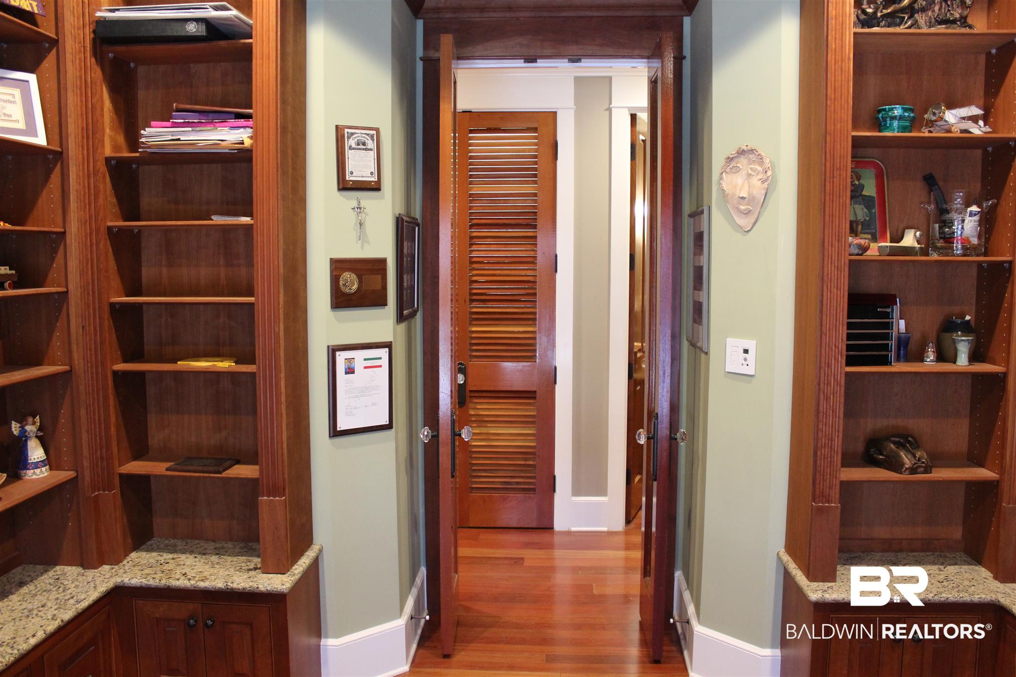 5187 Millhouse Road Gulf Shores, AL 36542 - Photo 24 of 49 Downstairs Built in book Cases