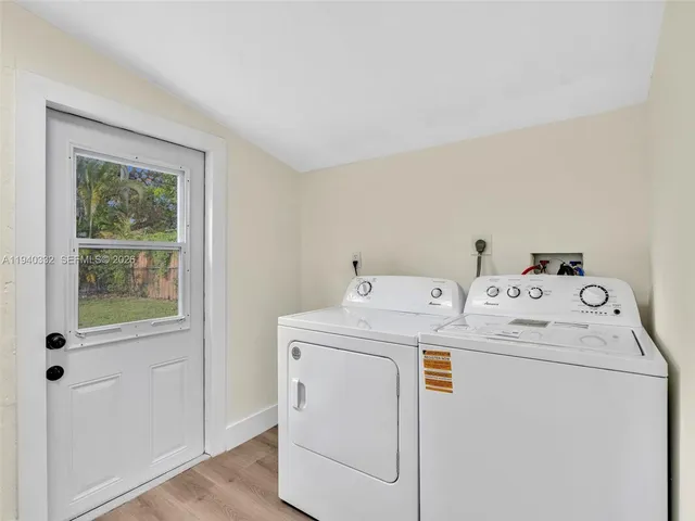 a utility room with dryer and washer