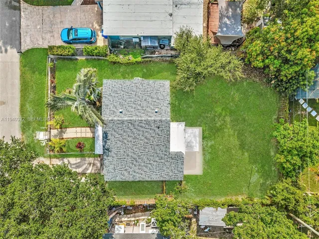 a aerial view of a house with a garden
