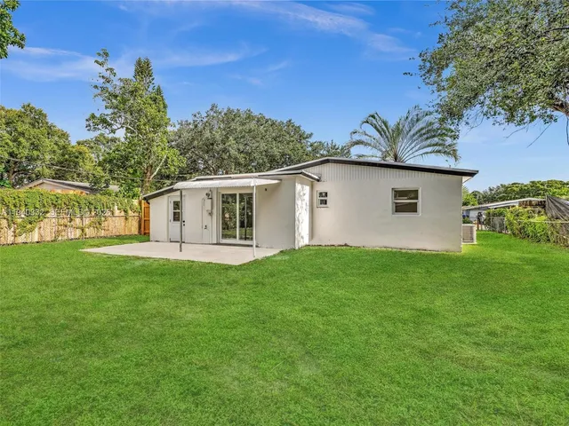 a house view with a garden space