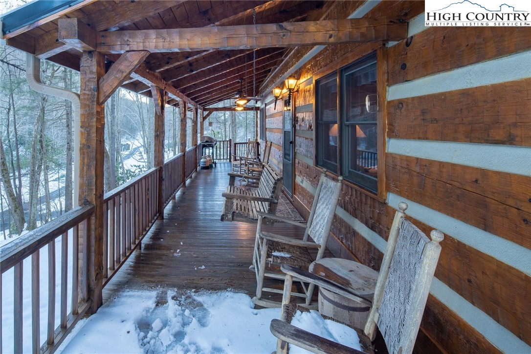240 Fox Den Road Ferguson, NC 28624 - Photo 3 of 40 a view of deck with wooden floor and outdoor seating