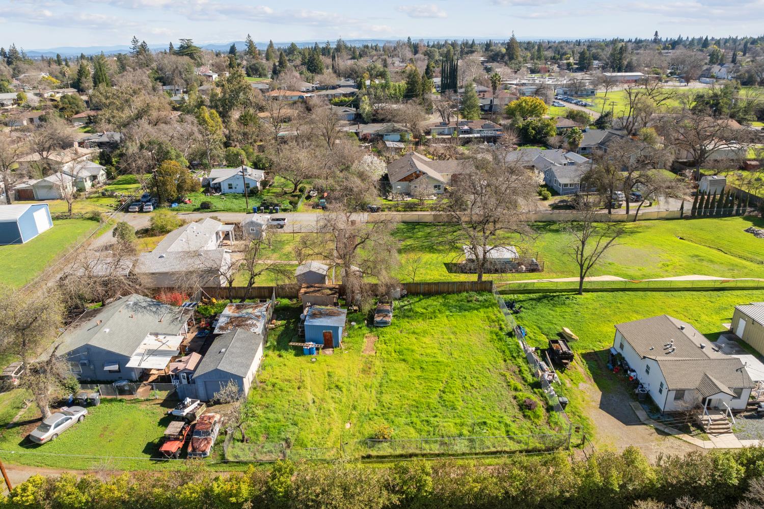 0 Ranch Avenue Citrus Heights, CA 95610 - Photo 7 of 11 an aerial view of residential houses with outdoor space and swimming pool