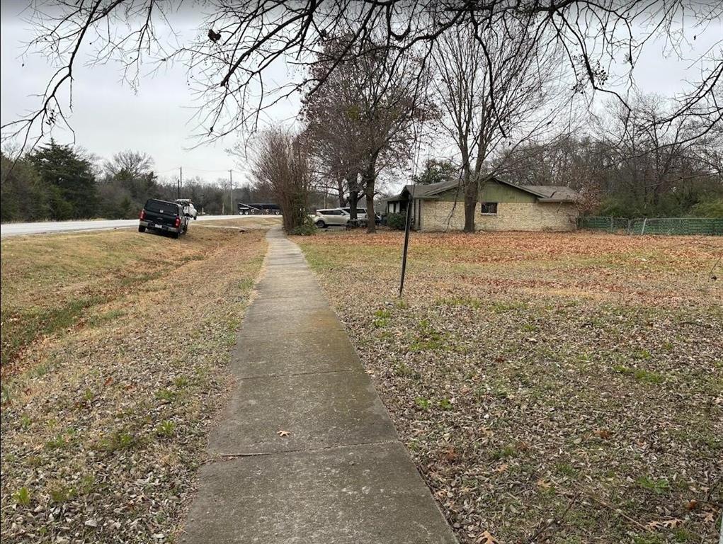 1118 North Lancaster Hutchins Road Lancaster, TX 75146 - Photo 3 of 3 a street view covered with snow