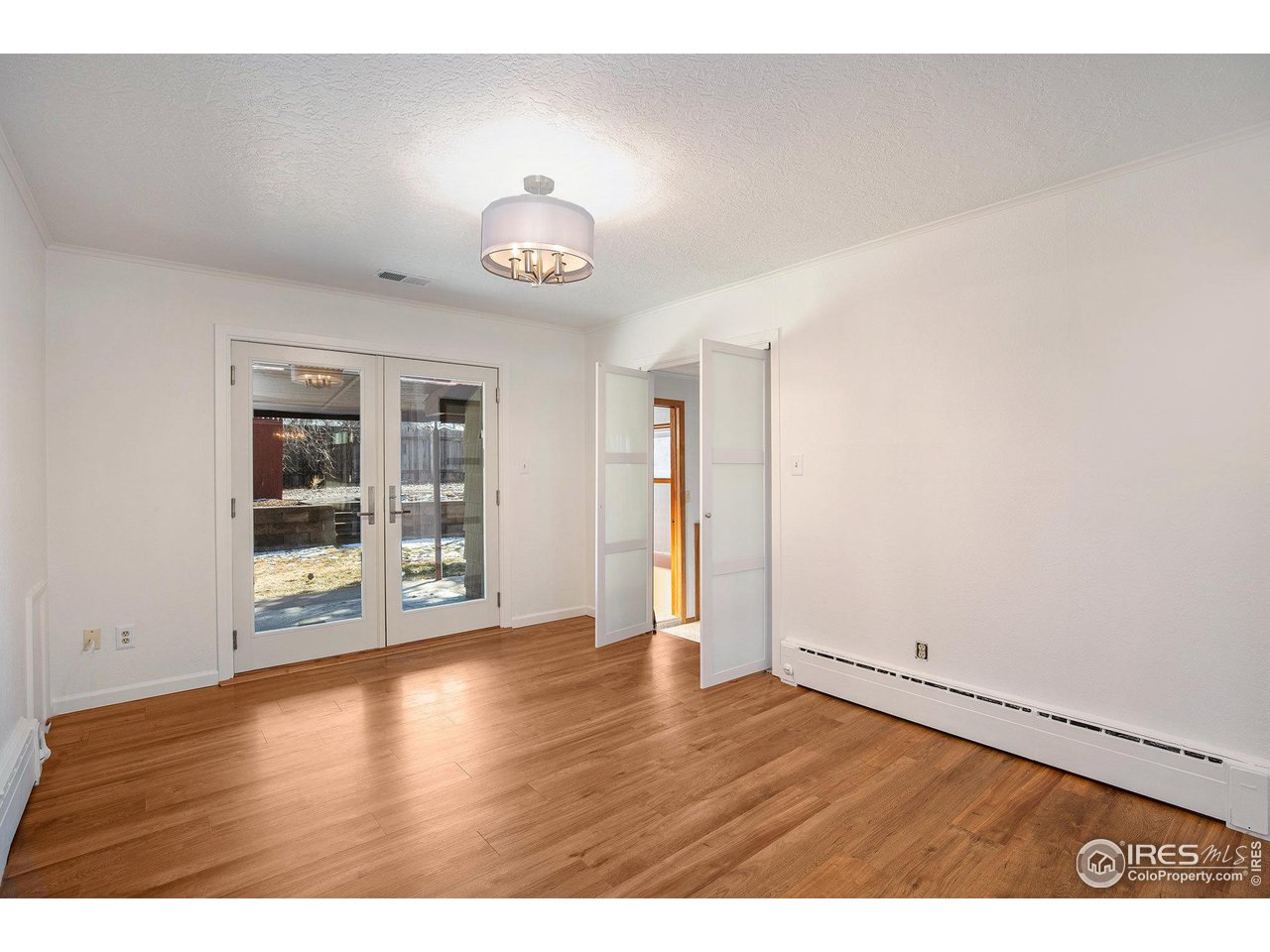 2728 25th Street Road Greeley, CO 80634 - Photo 14 of 40 Beautiful French Doors to Covered Back Patio