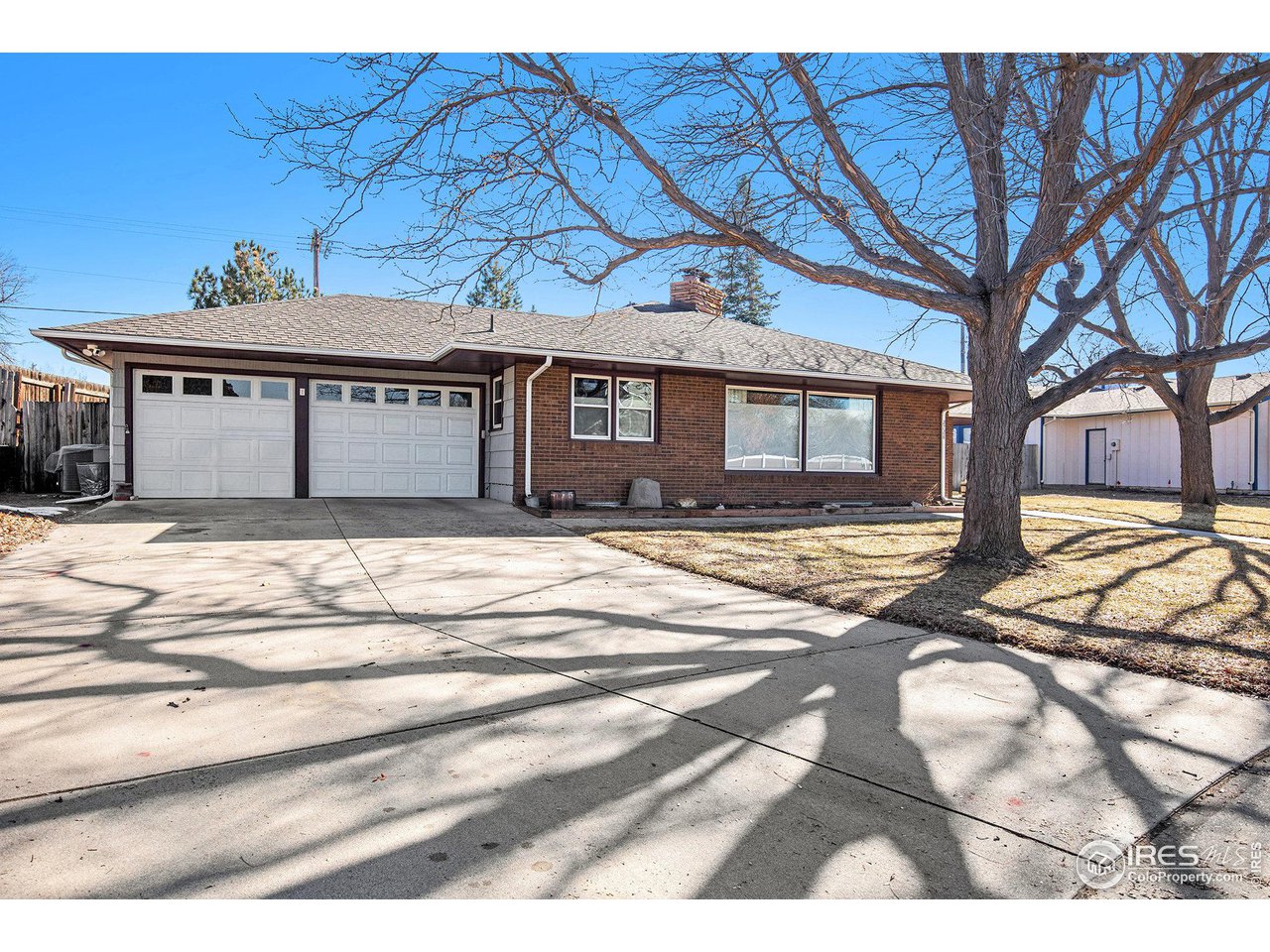 2728 25th Street Road Greeley, CO 80634 - Photo 3 of 40 2 Car Garage with large drive for any extra vehicles