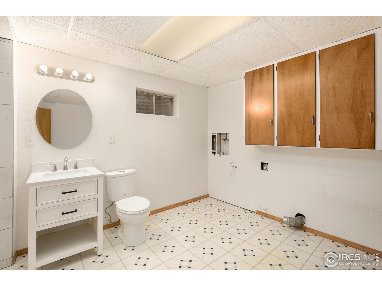 2728 25th Street Road Greeley, CO 80634 - Photo 35 of 40 Large laundry room with Built-Ins