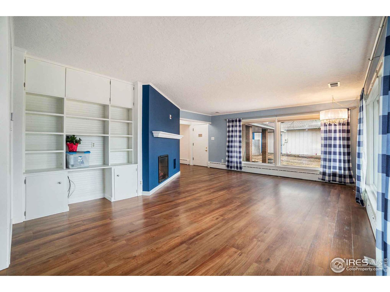 2728 25th Street Road Greeley, CO 80634 - Photo 8 of 40 Electric Fireplace, charming custom built-ins