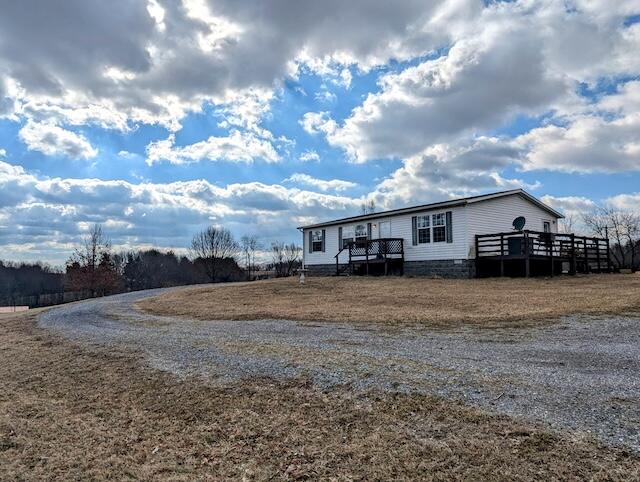 2550 Stonewall Road Northeast Check, VA 24072 - Photo 1 of 22 a front view of a house with a yard