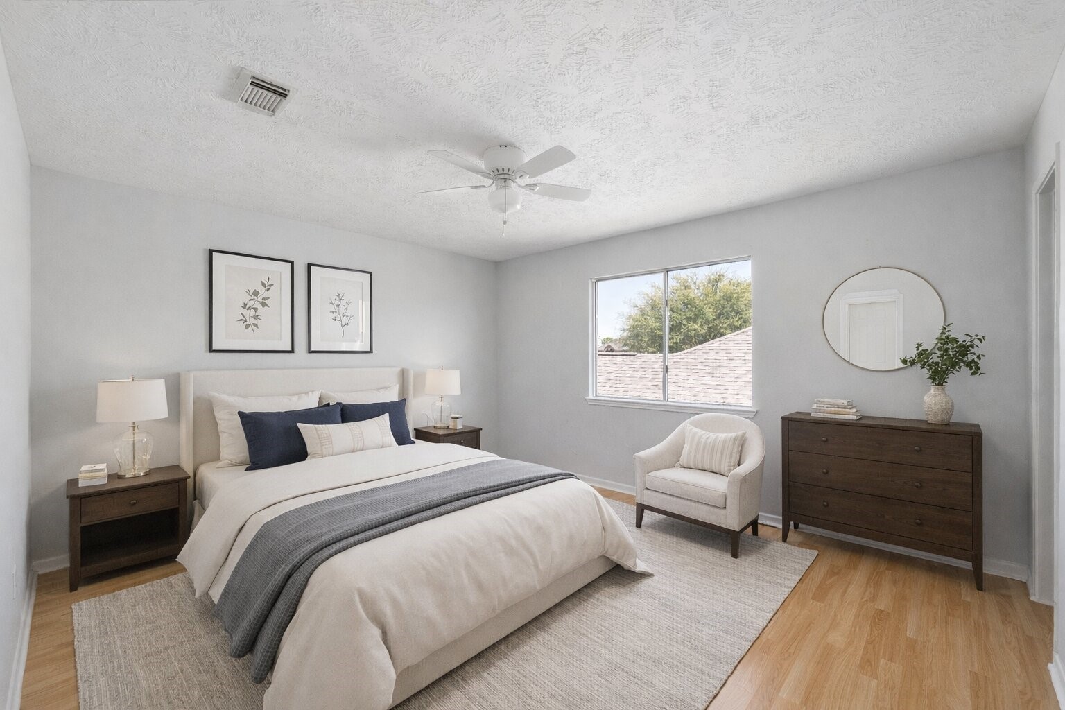 11959 Swords Creek Road Houston, TX 77067 - Photo 20 of 30 a bedroom with furniture and a window