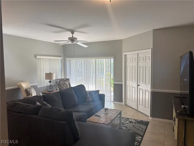 a bedroom with a bed and a walk in closet