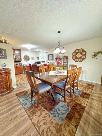 a bathroom with a sink a mirror and a toilet