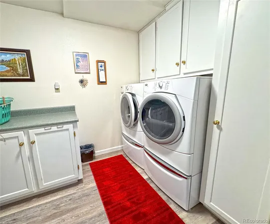 a living room with furniture and flat screen tv