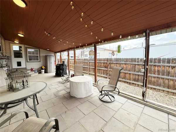 a house with trees in the background