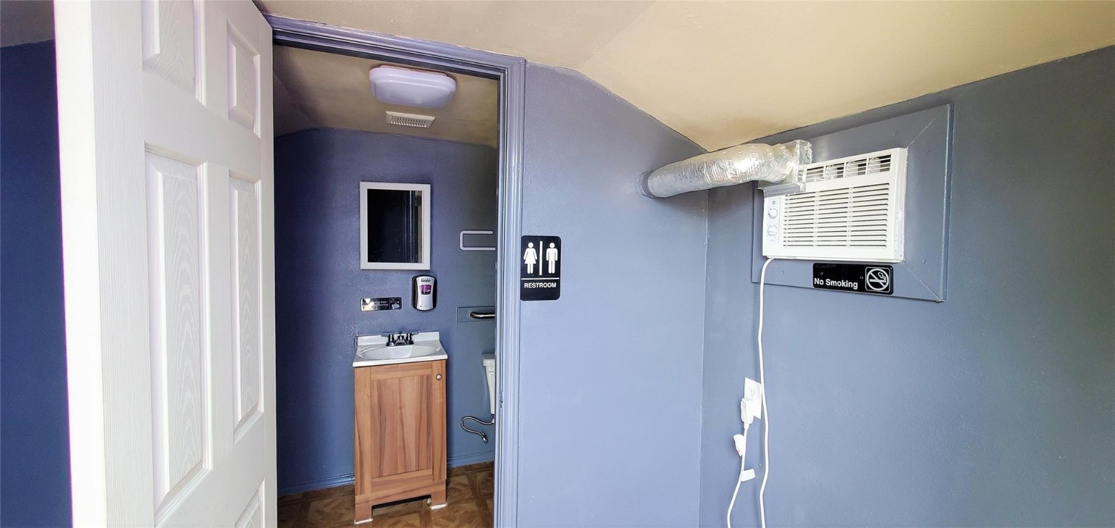 3903 Fulton Street Houston, TX 77009 - Photo 3 of 16 a view of a bedroom from a hallway