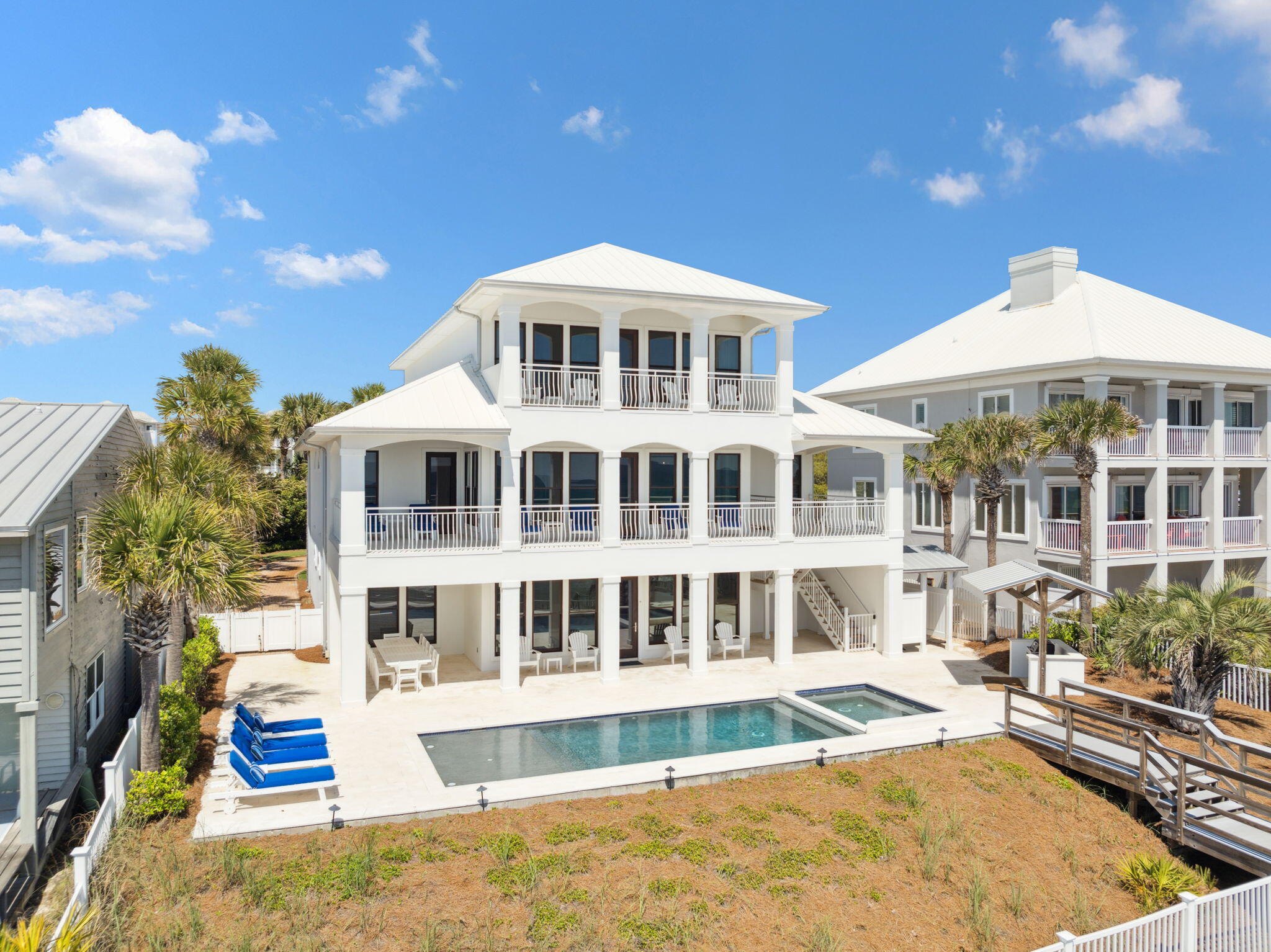 8266 East County Highway 30A Seacrest, FL 32461 - Photo 137 of 148 a front view of a house with a swimming pool
