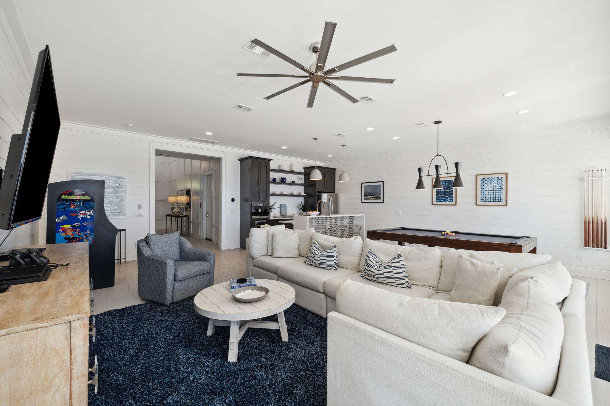 8266 East County Highway 30A Seacrest, FL 32461 - Photo 14 of 148 a living room with furniture a rug and a ceiling fan
