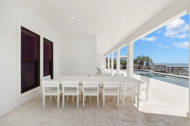 a kitchen with stainless steel appliances a stove a sink and a refrigerator