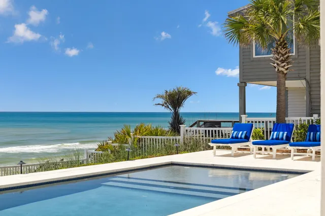 a kitchen with stainless steel appliances granite countertop a sink dishwasher stove and cabinets