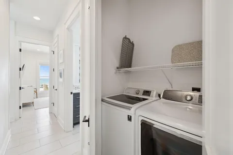 a bathroom with a double vanity sink mirror and double