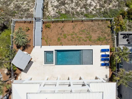 a living room with fireplace furniture and a flat screen tv