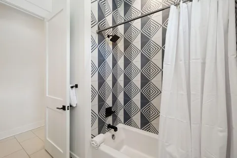 a bathroom with a sink mirror vanity and toilet