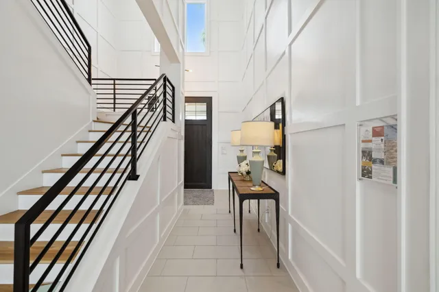 a front view of a house with a swimming pool