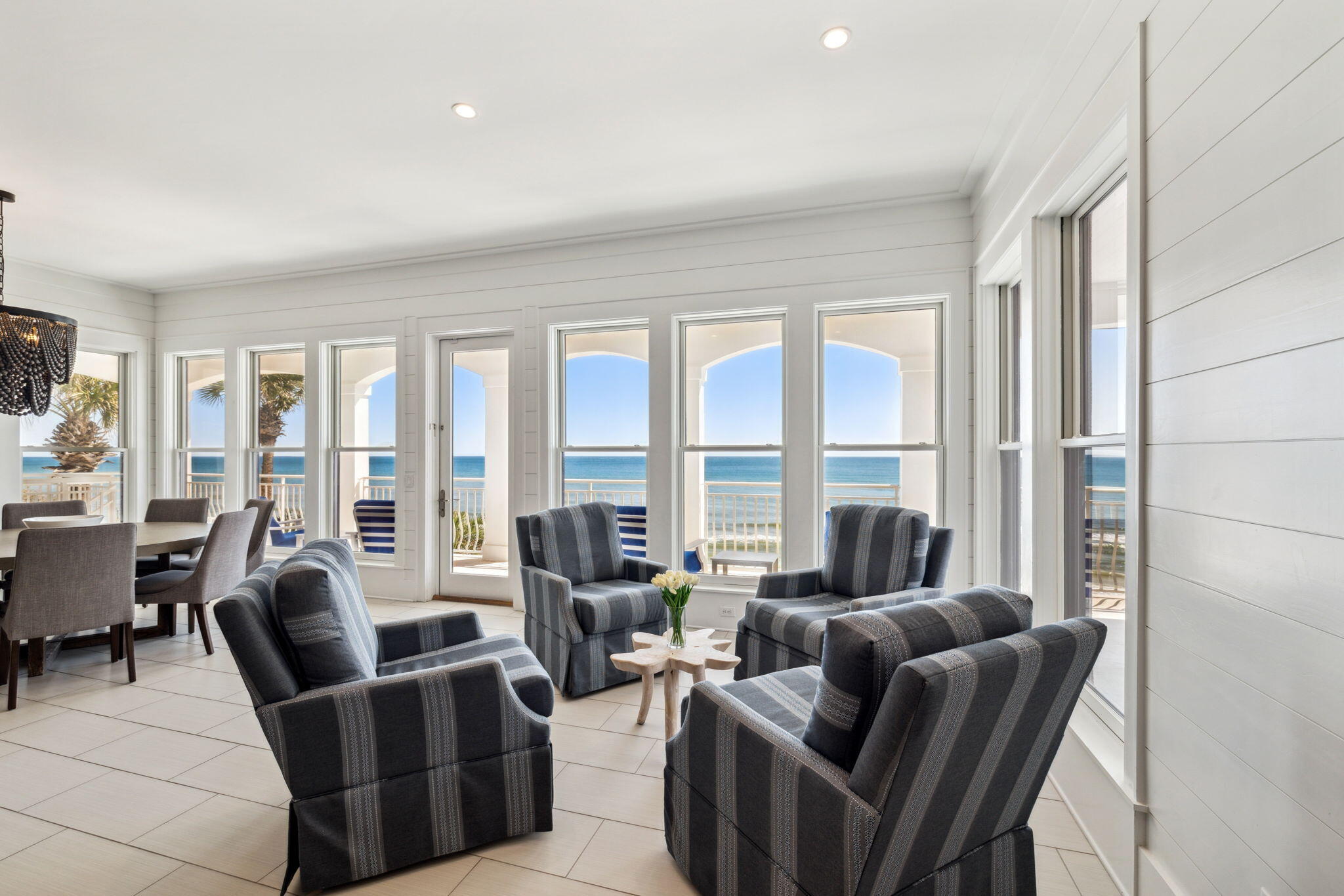 8266 East County Highway 30A Seacrest, FL 32461 - Photo 73 of 148 a living room with furniture and floor to ceiling windows