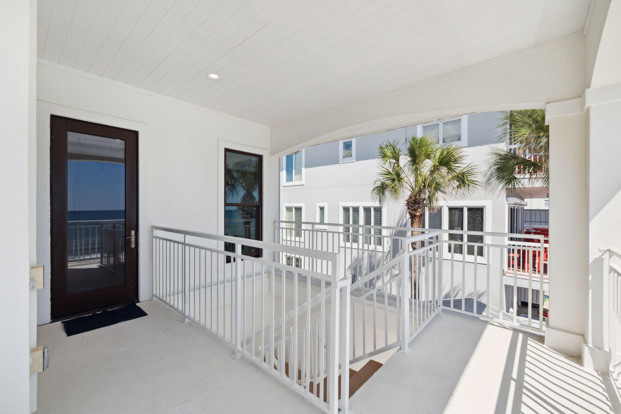 8266 East County Highway 30A Seacrest, FL 32461 - Photo 76 of 148 a view of a living room and entryway in a room