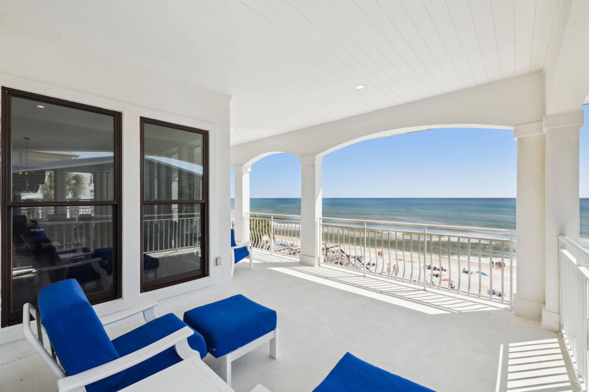 8266 East County Highway 30A Seacrest, FL 32461 - Photo 77 of 148 a living room with furniture and a floor to ceiling window