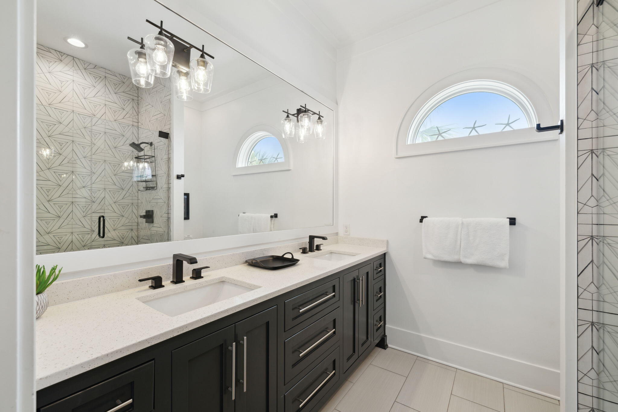 8266 East County Highway 30A Seacrest, FL 32461 - Photo 88 of 148 a bathroom with a double vanity sink mirror and double