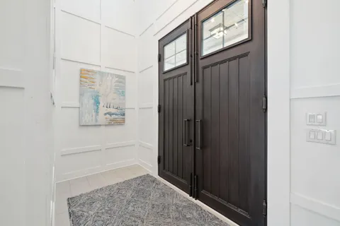 a view of swimming pool with outdoor seating and city view