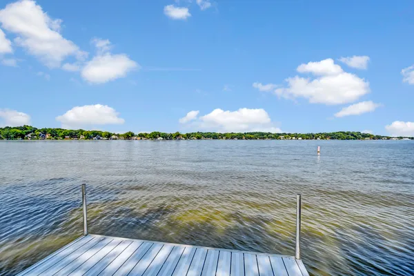 a view of a lake from a balcony