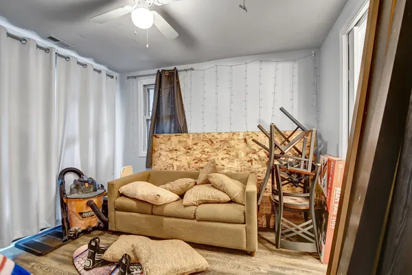 a bedroom with furniture and a couch