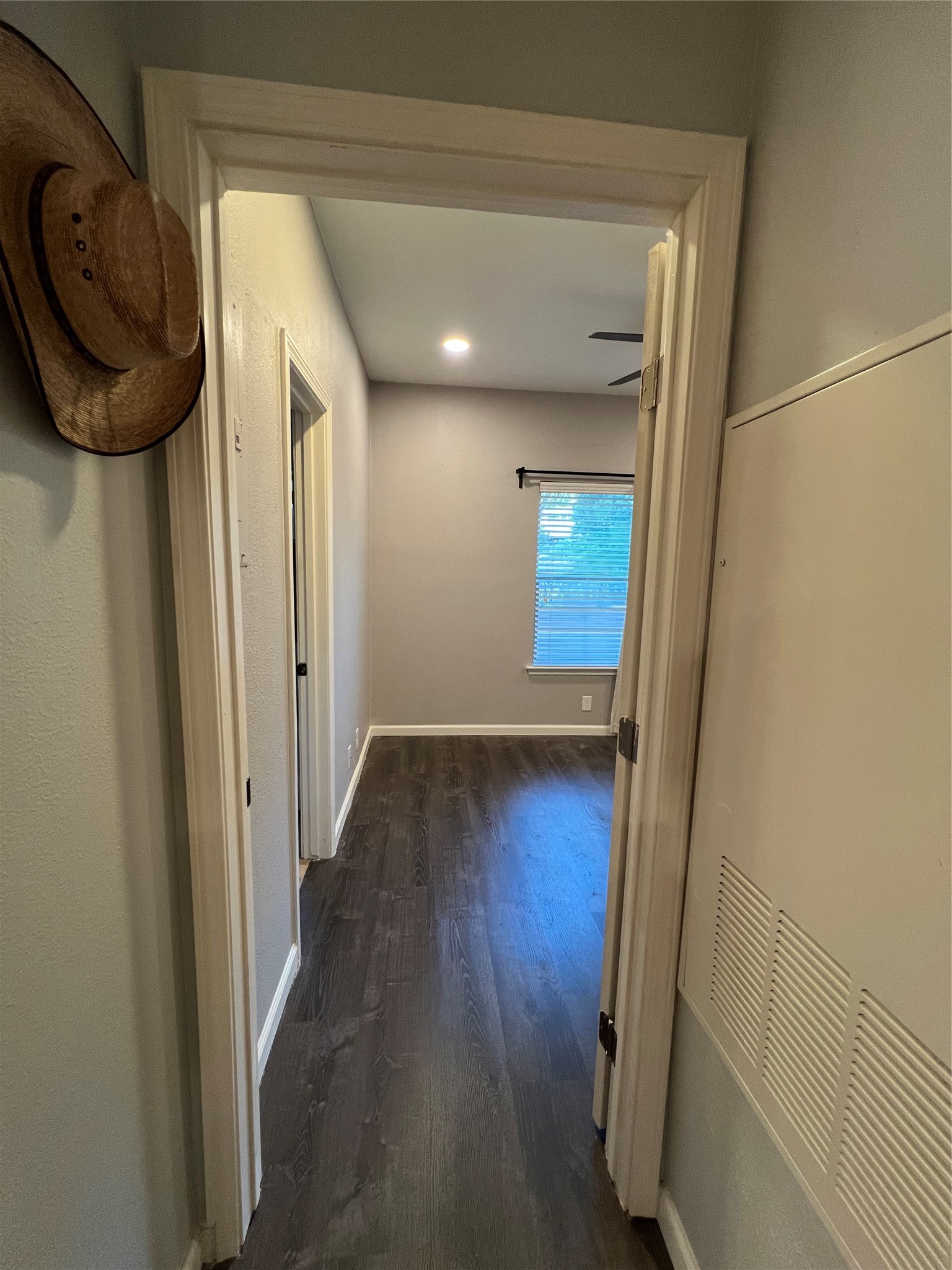 2414 Longview Street, Unit 202 Austin, TX 78705 - Photo 9 of 17 a view of a hallway with wooden floor
