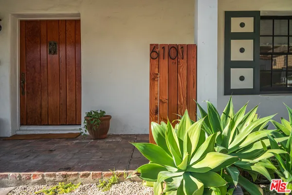a view of a entryway with wooden floor