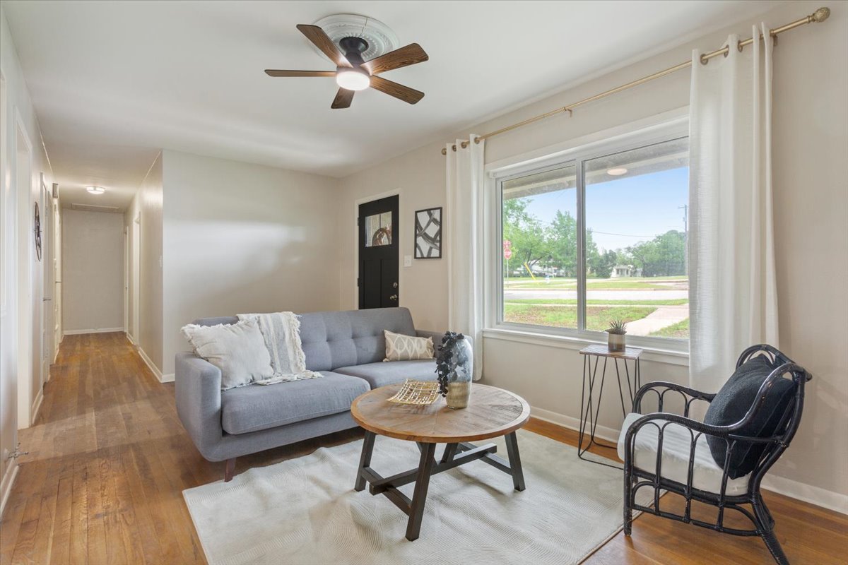 804 Ash Street Georgetown, TX 78626 - Photo 2 of 38 The large picture window fills the living space with natural light