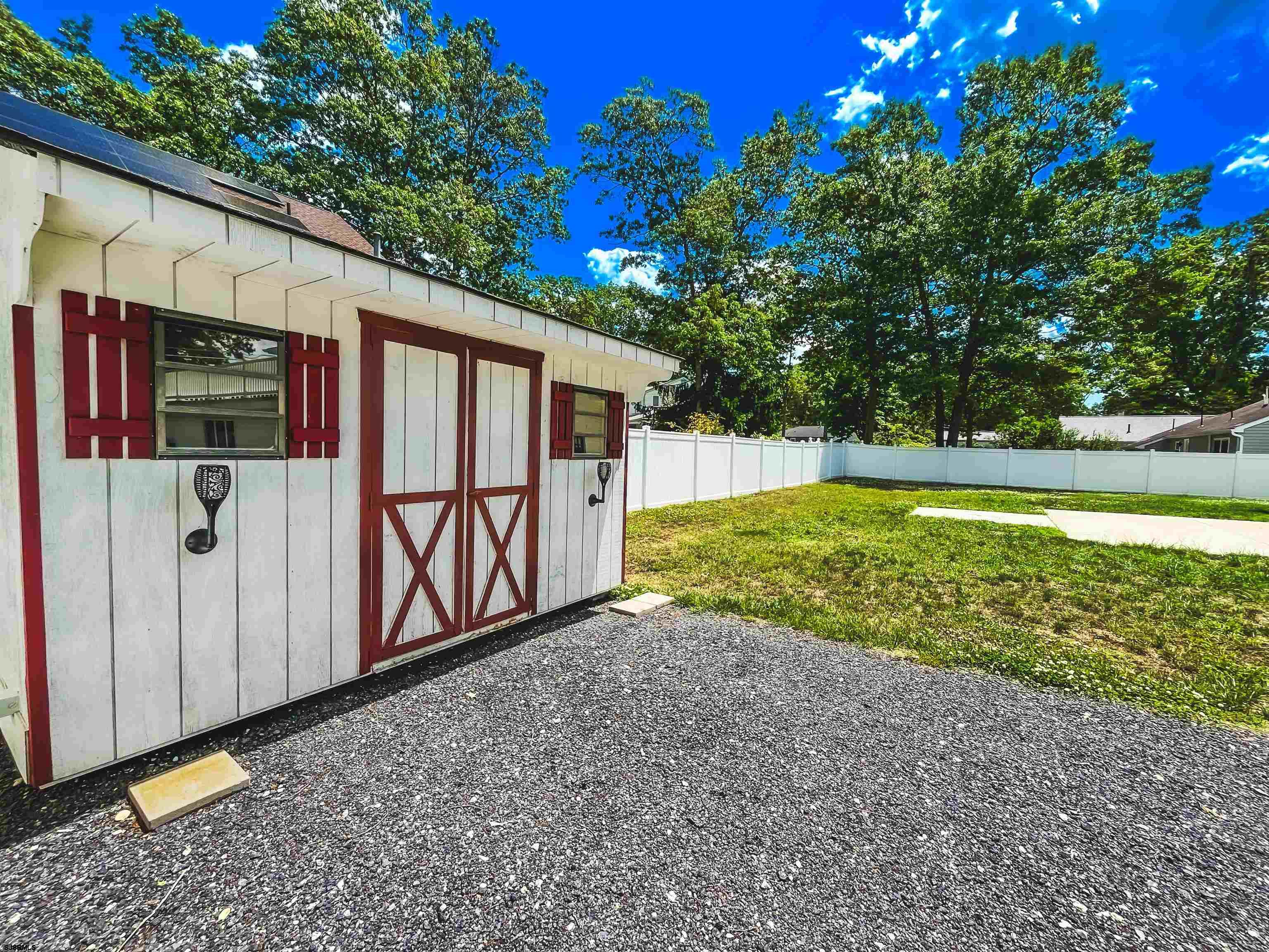 518 Delaware Avenue Absecon, NJ 08201 - Photo 35 of 38 a view of swimming pool with a yard